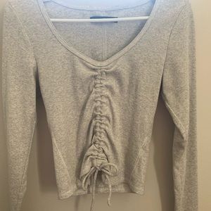 cute gray long sleeve top tied at the bottom